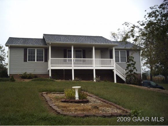 440 Ridge Road Mount Solon, VA 22843 - Photo 1 of 6 a front view of a house with a yard