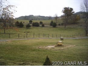 440 Ridge Road Mount Solon, VA 22843 - Photo 6 of 6 a view of a lake with a mountain