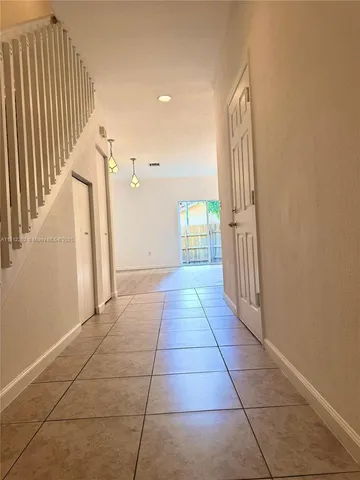 a view of entryway with stairs