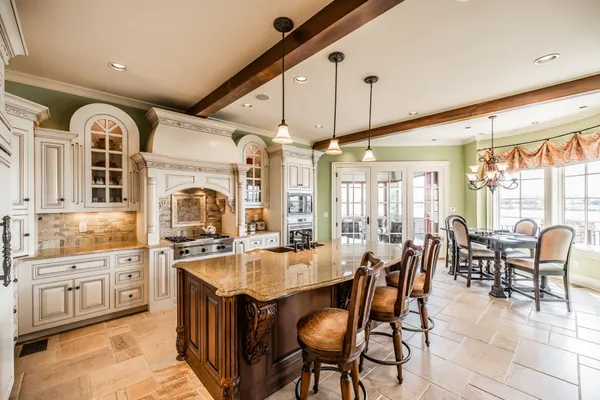 a view of a dining room with furniture window and outside view