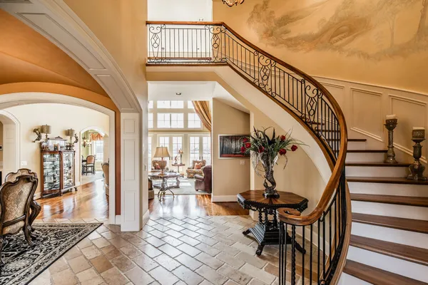 a view of entryway with wooden floor and a rug