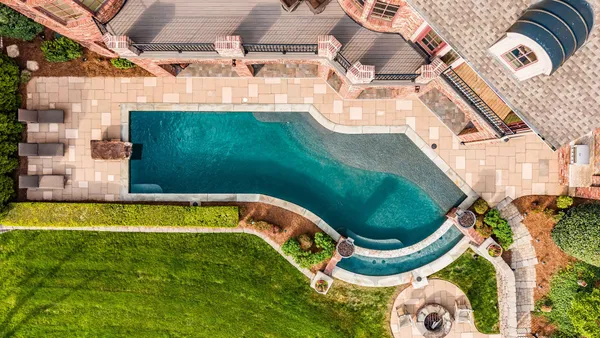 an aerial view of a swimming pool