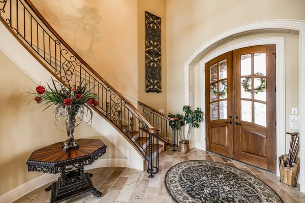 a view of entryway with a front door