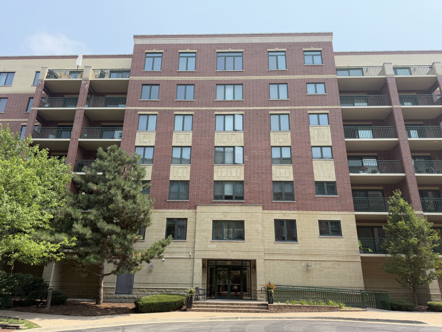 20 South Main Street, Unit 506 Mount Prospect, IL 60056 - Photo 1 of 22 a front view of a building