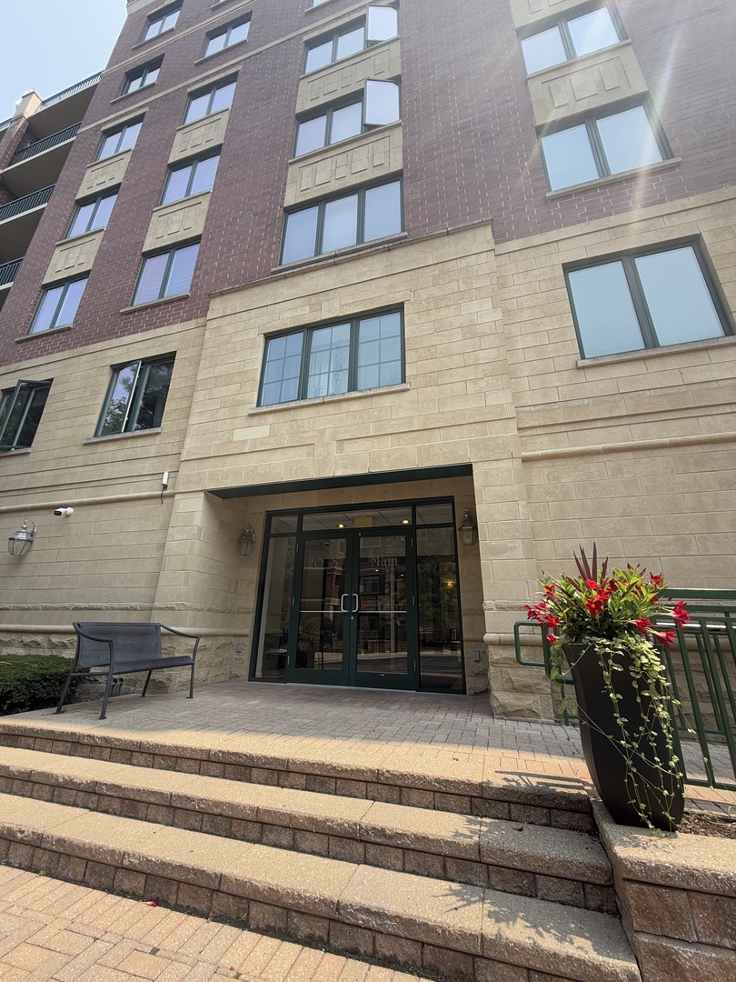 20 South Main Street, Unit 506 Mount Prospect, IL 60056 - Photo 2 of 22 a view of a building and a window