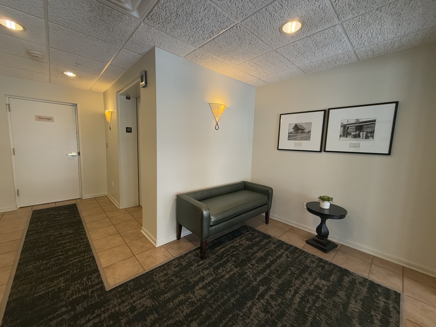 20 South Main Street, Unit 506 Mount Prospect, IL 60056 - Photo 3 of 22 a bedroom with furniture and a rug