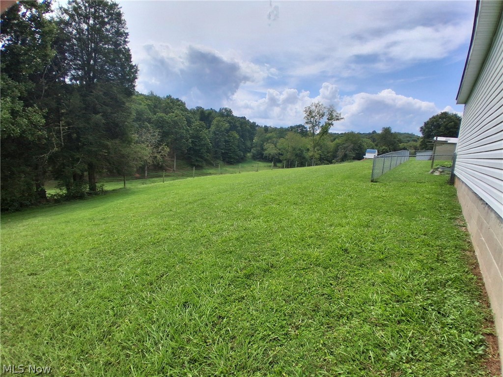 413 New England Ridge Road Washington, WV 26181 - Photo 15 of 15 backyard partially chain-link fenced