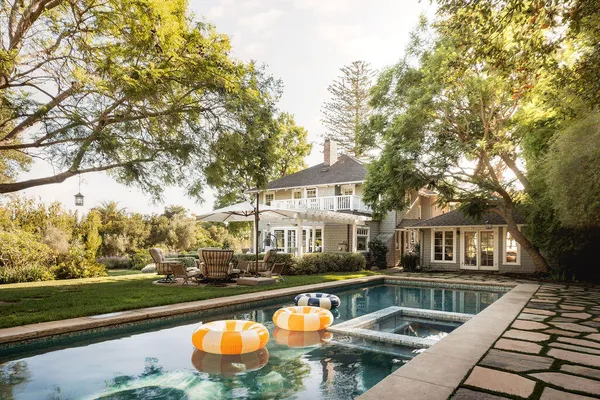 a front view of a house with swimming pool