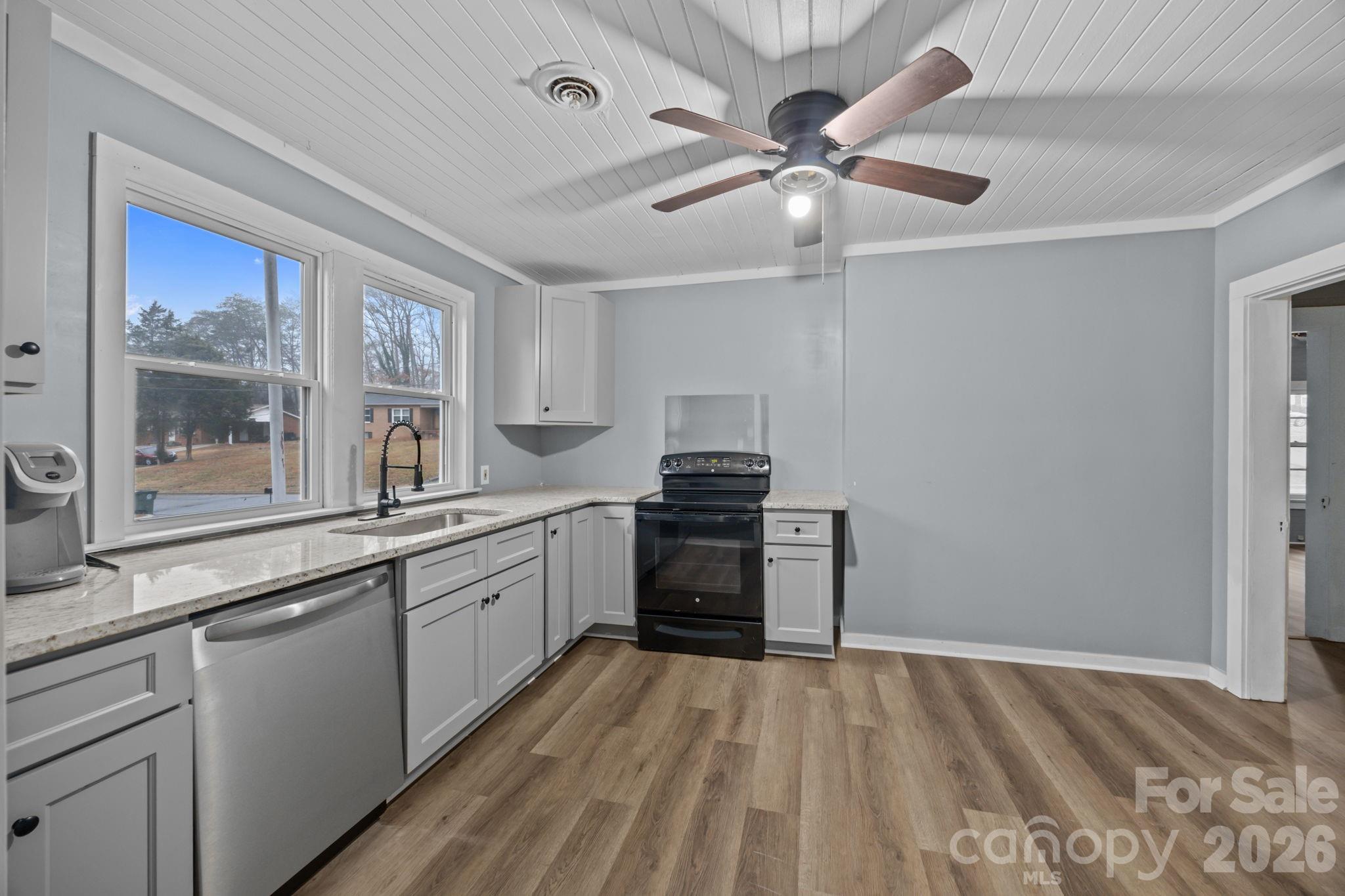 713 2nd St Place Southwest Conover, NC 28613 - Photo 21 of 31 a kitchen with a sink appliances and cabinets
