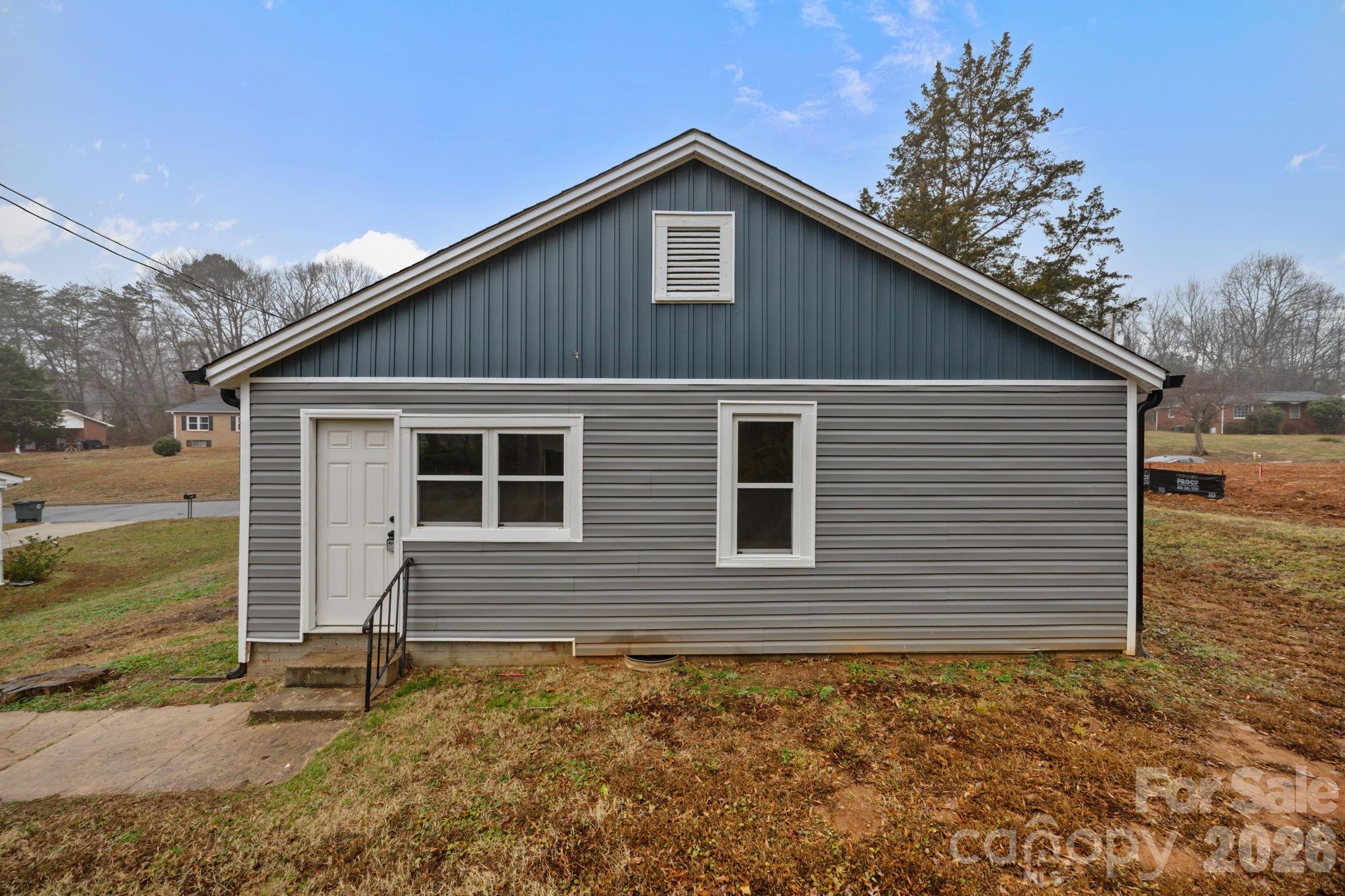713 2nd St Place Southwest Conover, NC 28613 - Photo 5 of 31 a front view of a house with a yard