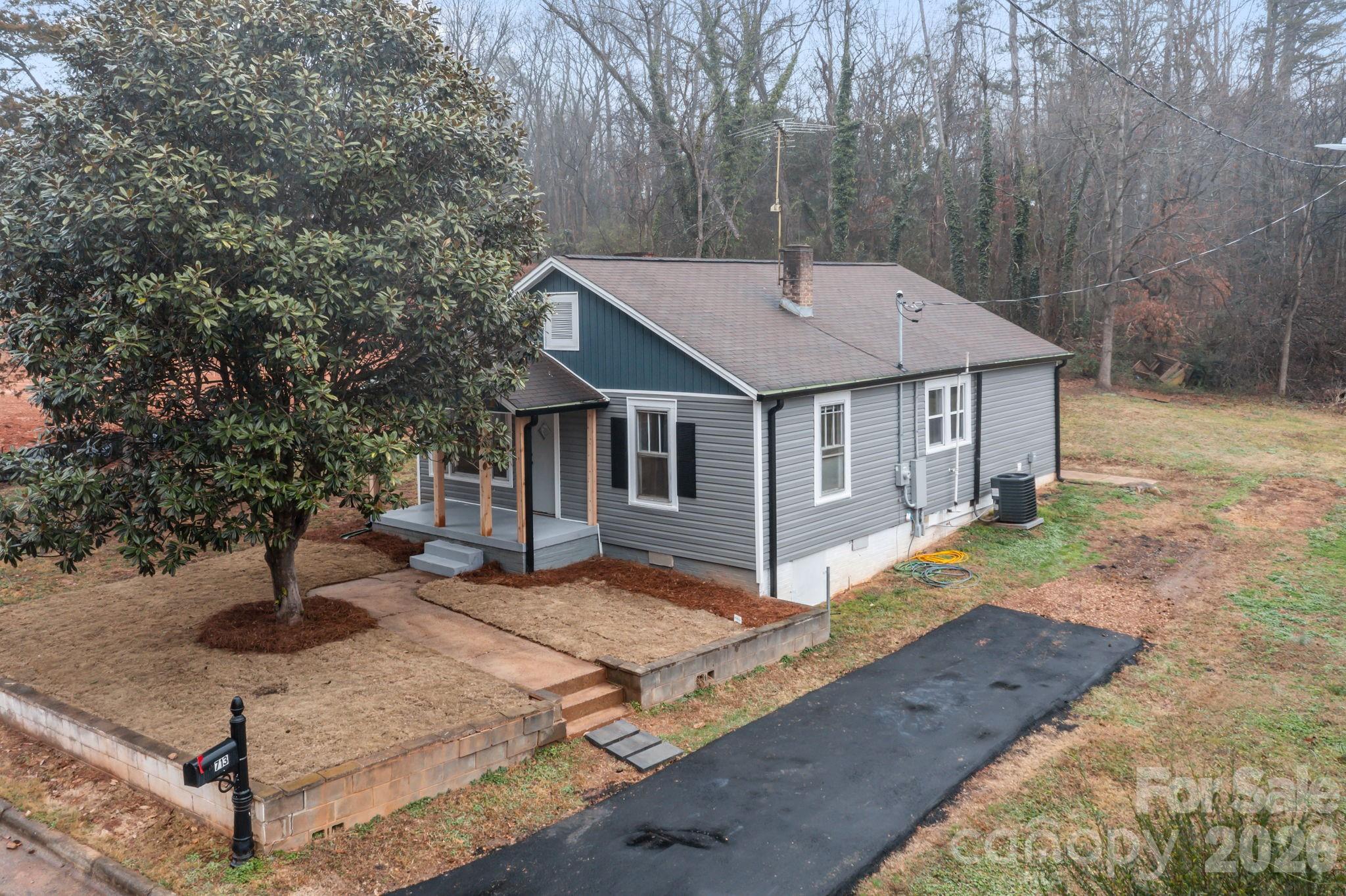 713 2nd St Place Southwest Conover, NC 28613 - Photo 6 of 31 a view of a house with backyard