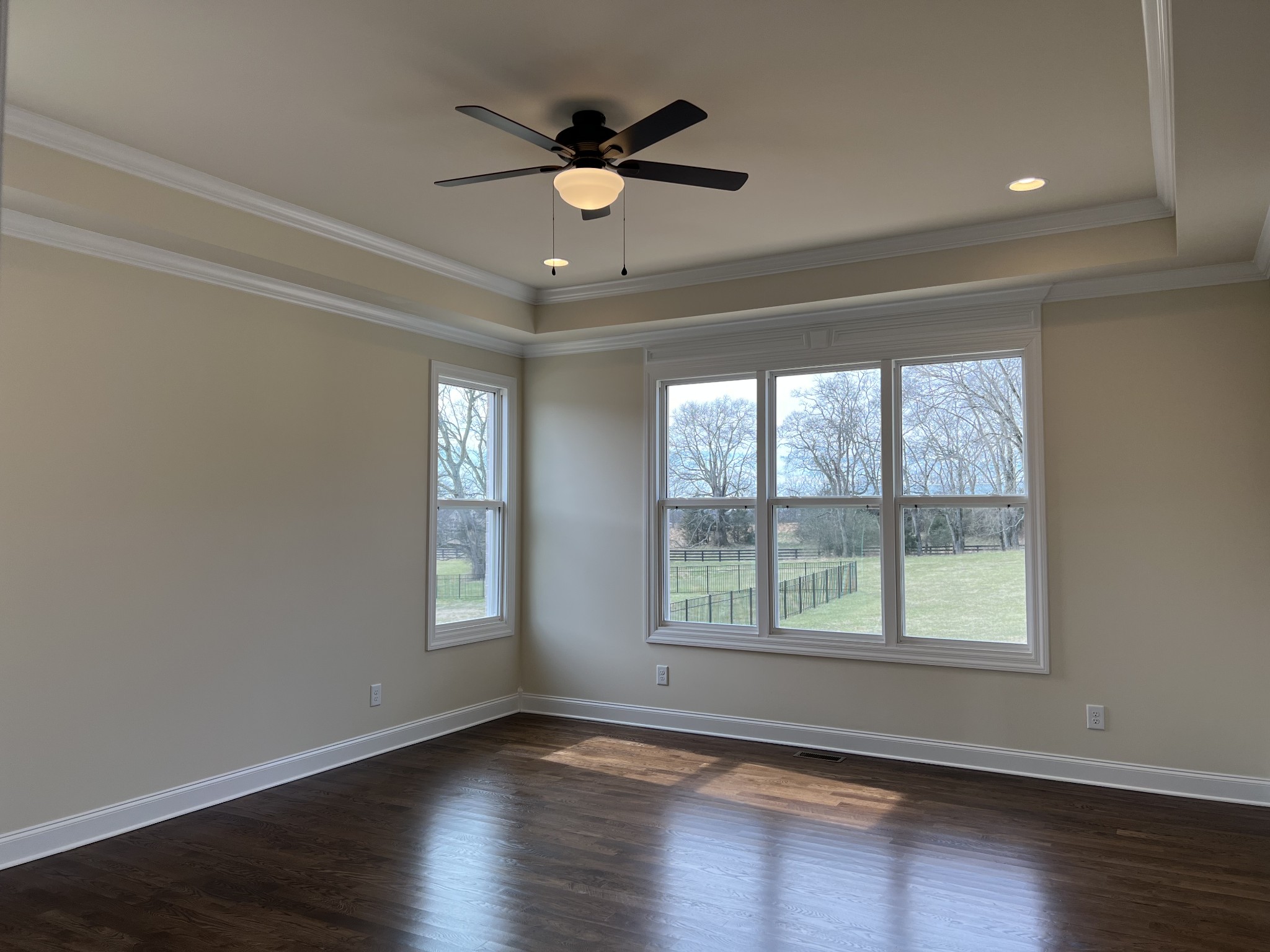 1067 Hideaway Road Columbia, TN 38401 - Photo 3 of 7 a view of an empty room with wooden floor and a window