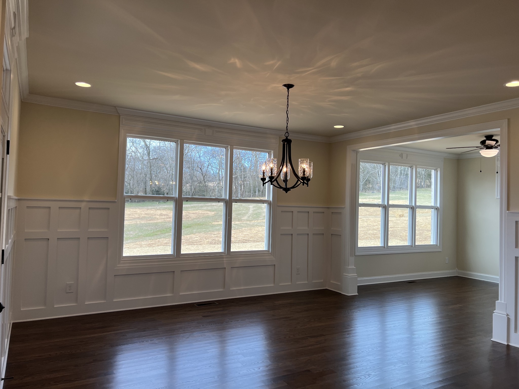 1067 Hideaway Road Columbia, TN 38401 - Photo 5 of 7 a view of an empty room with wooden floor and a window