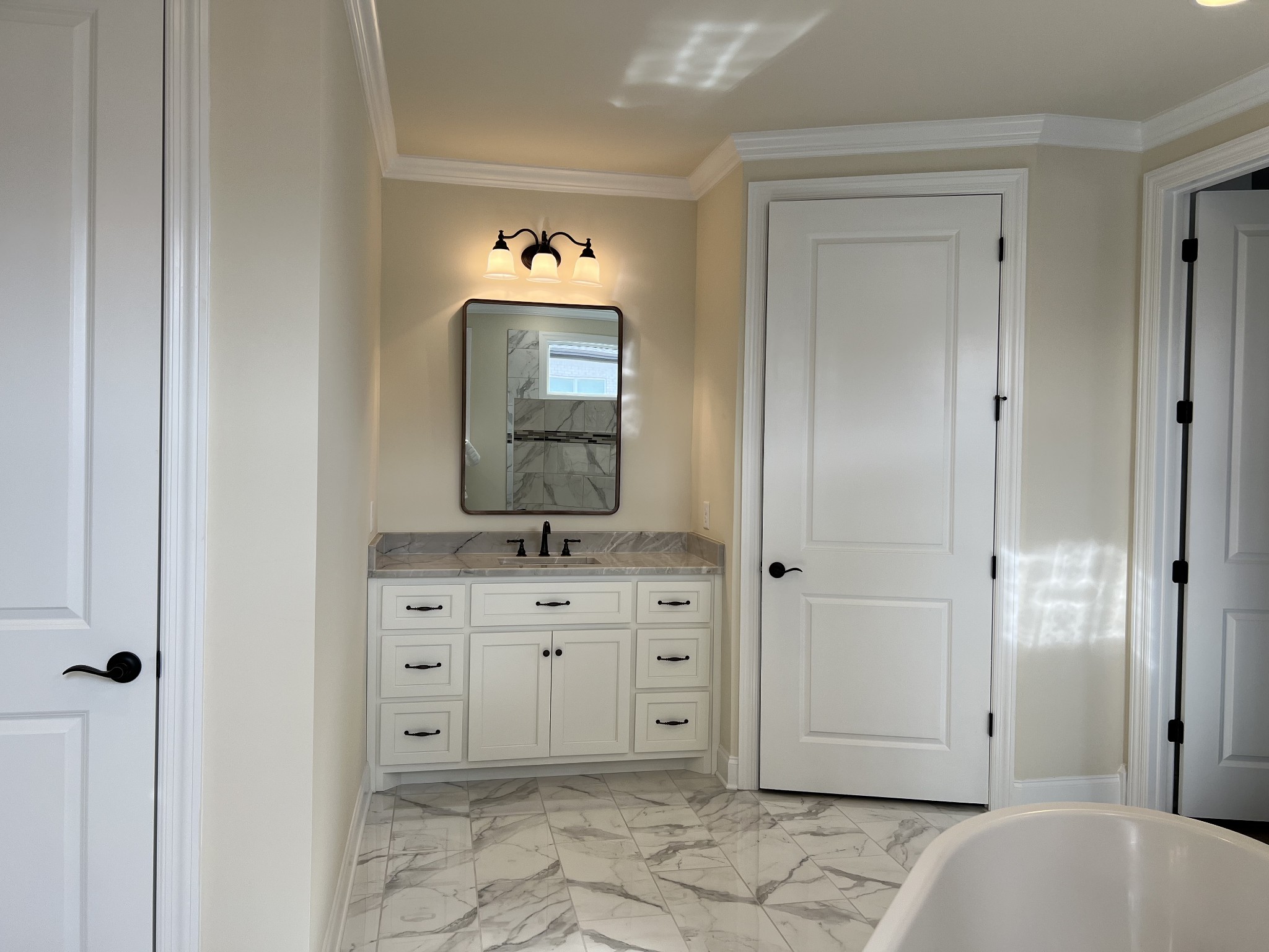 1067 Hideaway Road Columbia, TN 38401 - Photo 7 of 7 a spacious bathroom with a sink a mirror and shower