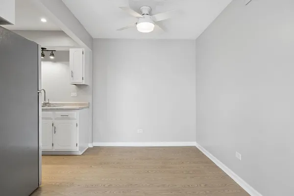 an empty room with a bathroom