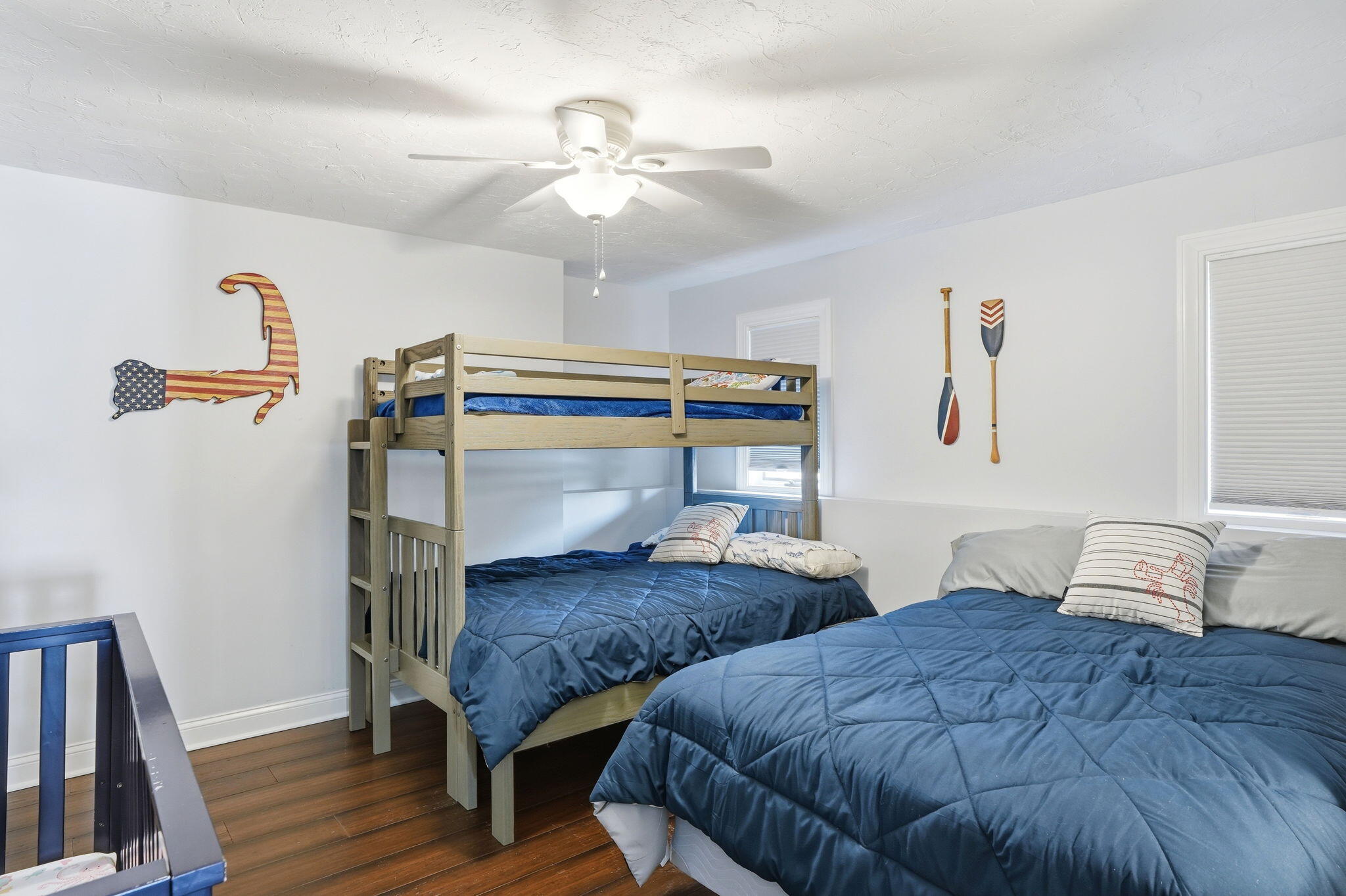 4 Cross Road Bourne, MA 02532 - Photo 31 of 47 a bedroom with two beds and a chandelier