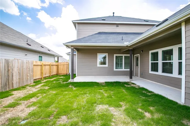 a view of a backyard with a garden