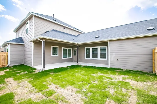 a view of a backyard with a garden