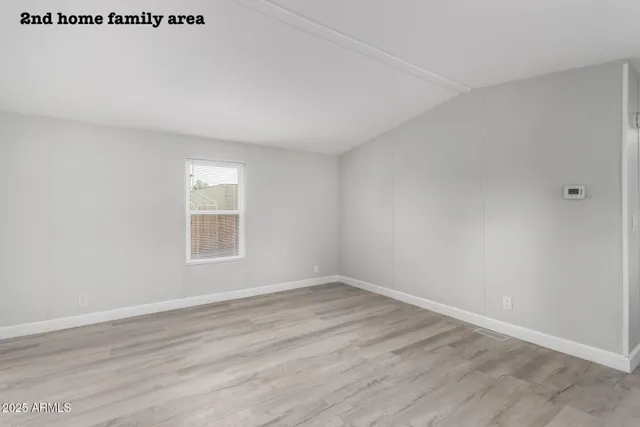 a bathroom with a sink a vanity and shower