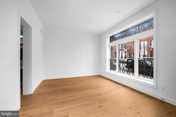 a view of an empty room with a window