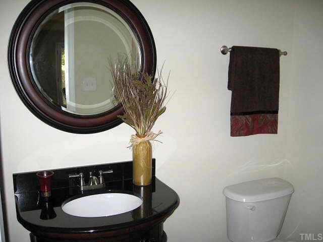 611 Brent Road Raleigh, NC 27606 - Photo 6 of 10 Gorgeous first floor bath with new vanity & tile floor Other