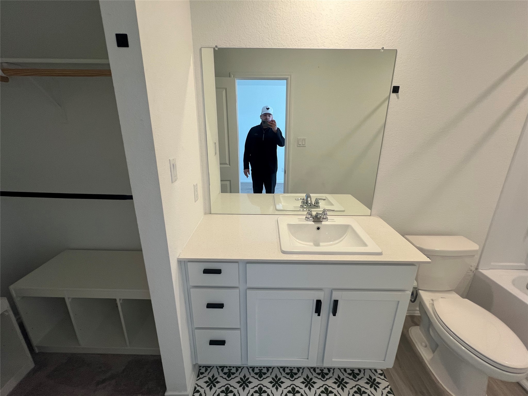 520 Commander Abbott Drive Jarrell, TX 76537 - Photo 13 of 25 a bathroom with a sink toilet and mirror