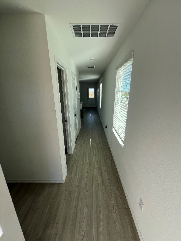 520 Commander Abbott Drive Jarrell, TX 76537 - Photo 4 of 25 a view of a hallway with wooden floor and staircase