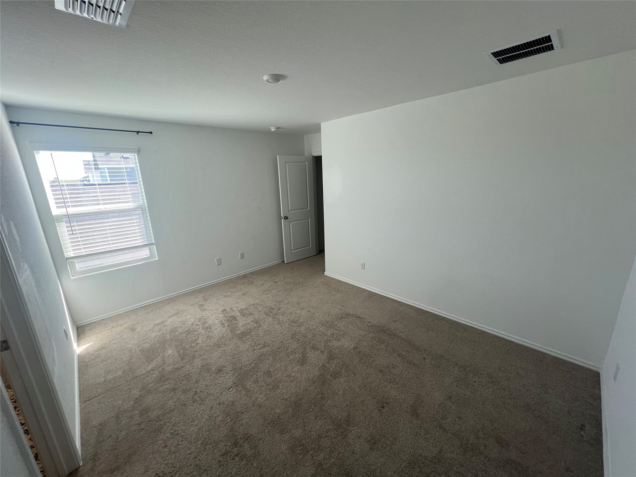 520 Commander Abbott Drive Jarrell, TX 76537 - Photo 10 of 25 an empty room with windows