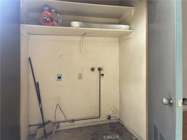 a utility room with a shower