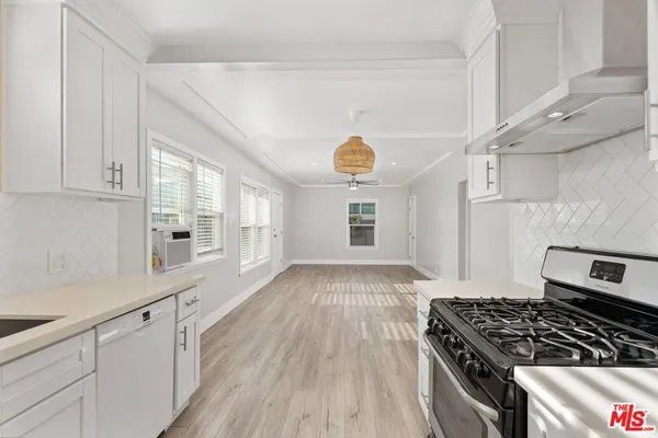 a view of washer and dryer in a utility room