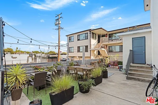 a view of balcony with furniture