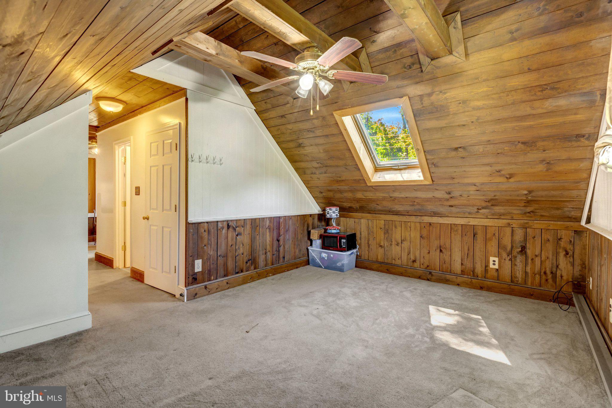 8844 McGrath Road Manassas, VA 20112 - Photo 22 of 27 Charming attic space with rustic beams.