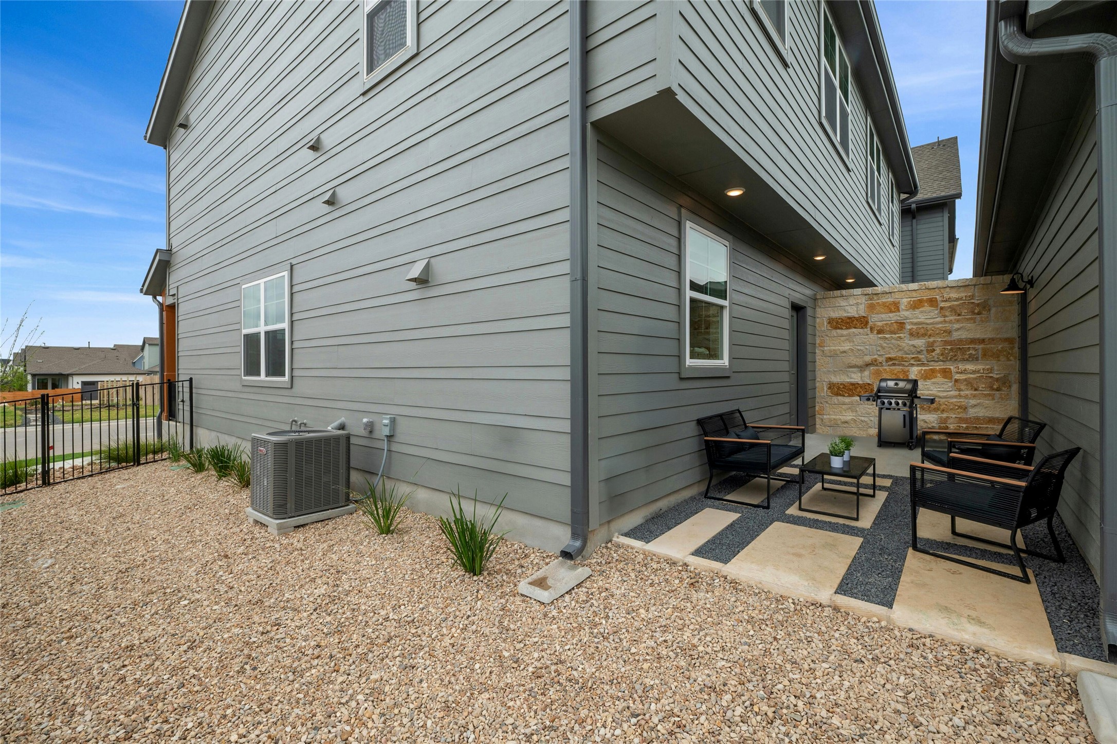 5804 Rotunda View Austin, TX 78747 - Photo 4 of 27 A secluded side patio area provides a private space for outdoor gatherings and relaxation.