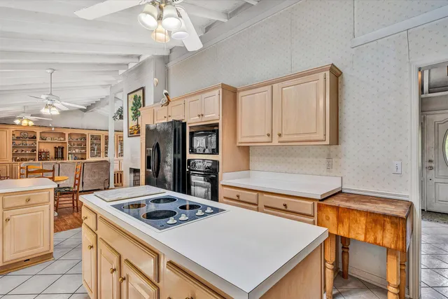 a room with furniture and flat screen tv