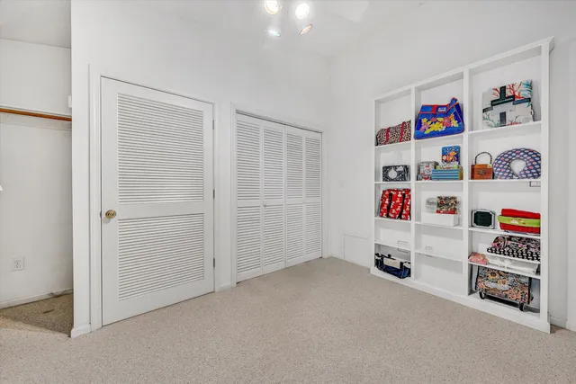 a view of a balcony with wooden floor