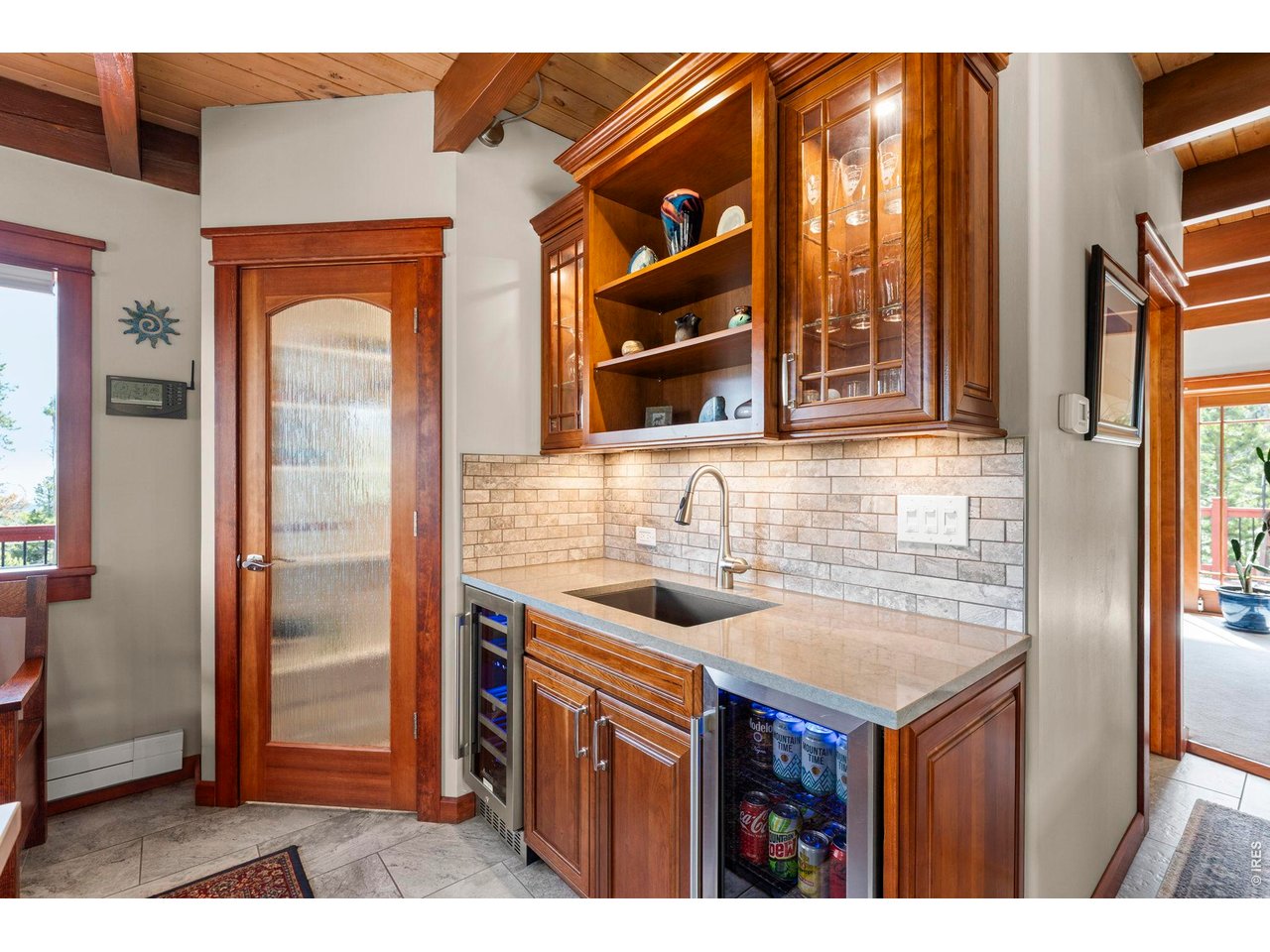 1109 Indian Peak Road Golden, CO 80403 - Photo 6 of 50 Walk in pantry with wet bar area