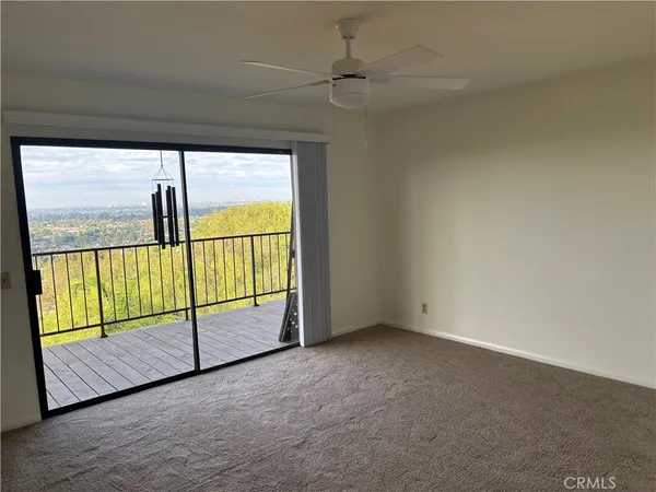 an empty room with sliding door