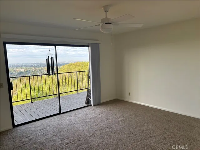 an empty room with sliding door