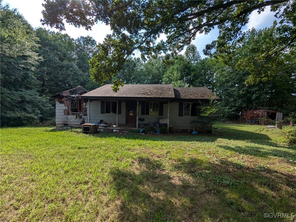 3961 Old Buckingham Road Powhatan, VA 23139 - Photo 1 of 7 a front view of a house with a yard