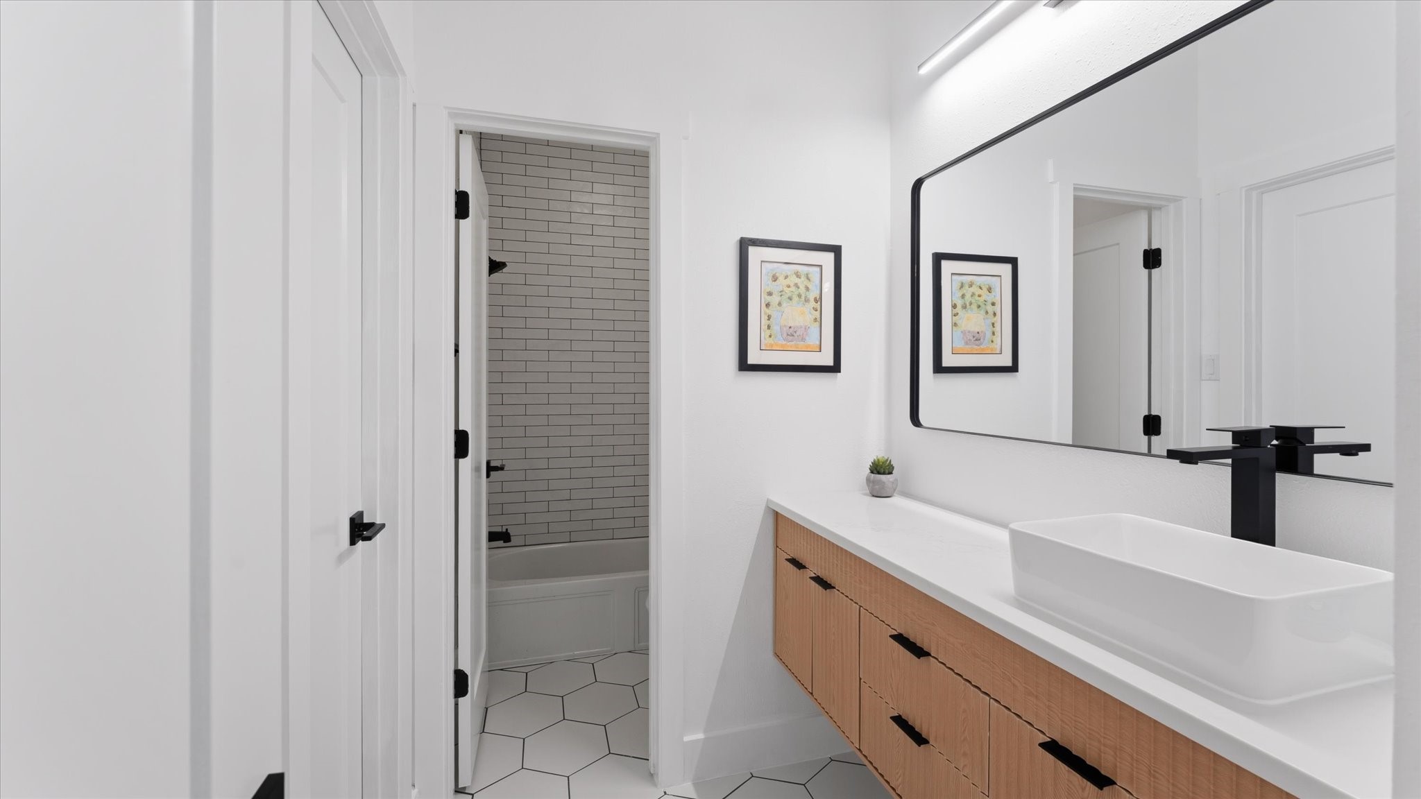 2 South Winsome Path Circle Spring, TX 77382 - Photo 34 of 47 a bathroom with a sink and a mirror