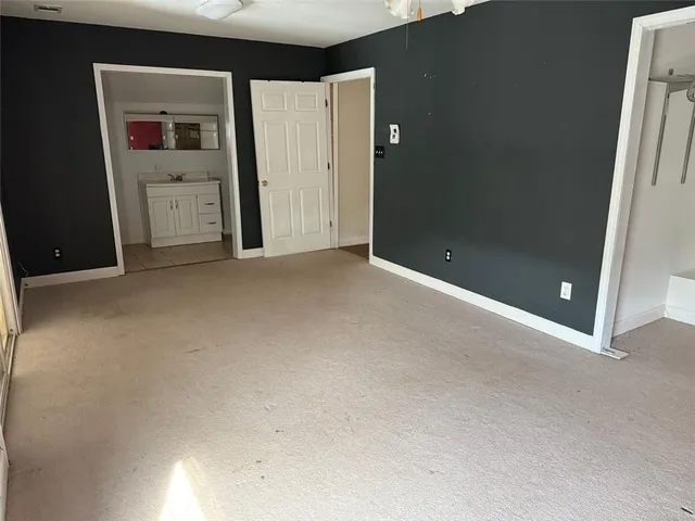 a bathroom with a sink and vanity