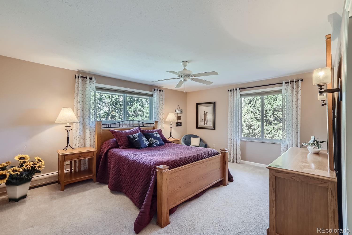 6227 Colorow Drive Morrison, CO 80465 - Photo 17 of 43 a bedroom with a bed and a window