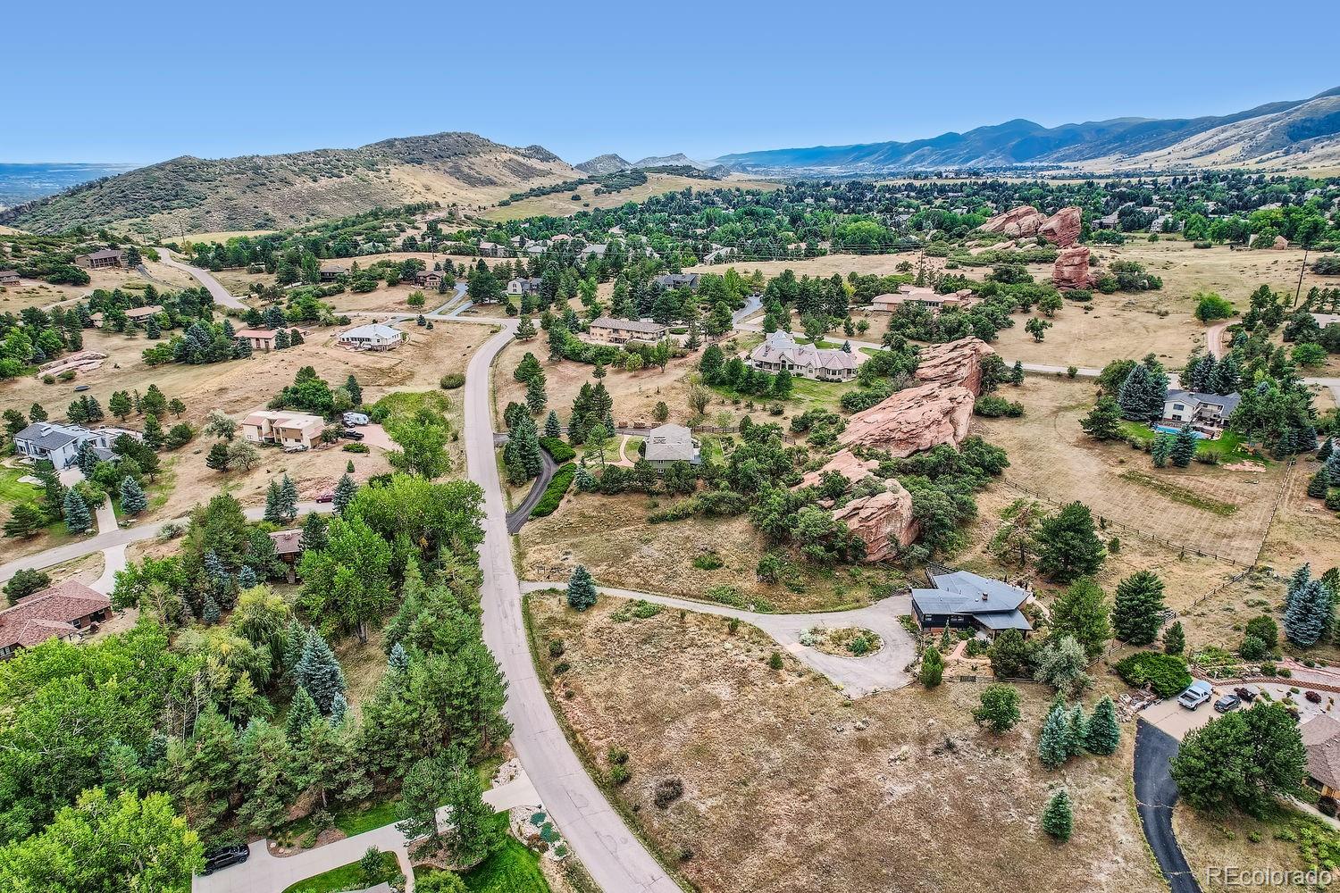 6227 Colorow Drive Morrison, CO 80465 - Photo 42 of 43 an aerial view of residential houses with outdoor space and trees