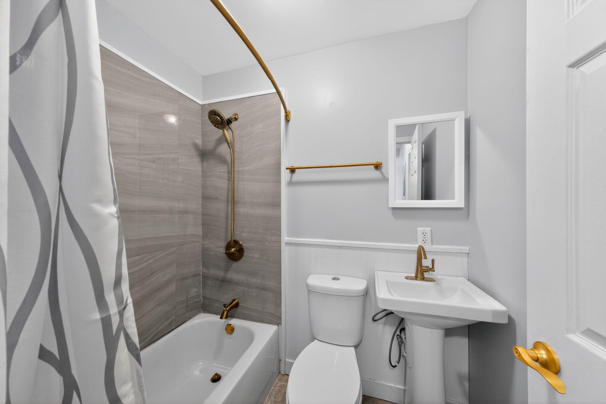 1908 Central Drive Gary, IN 46407 - Photo 23 of 29 a bathroom with a sink toilet and shower