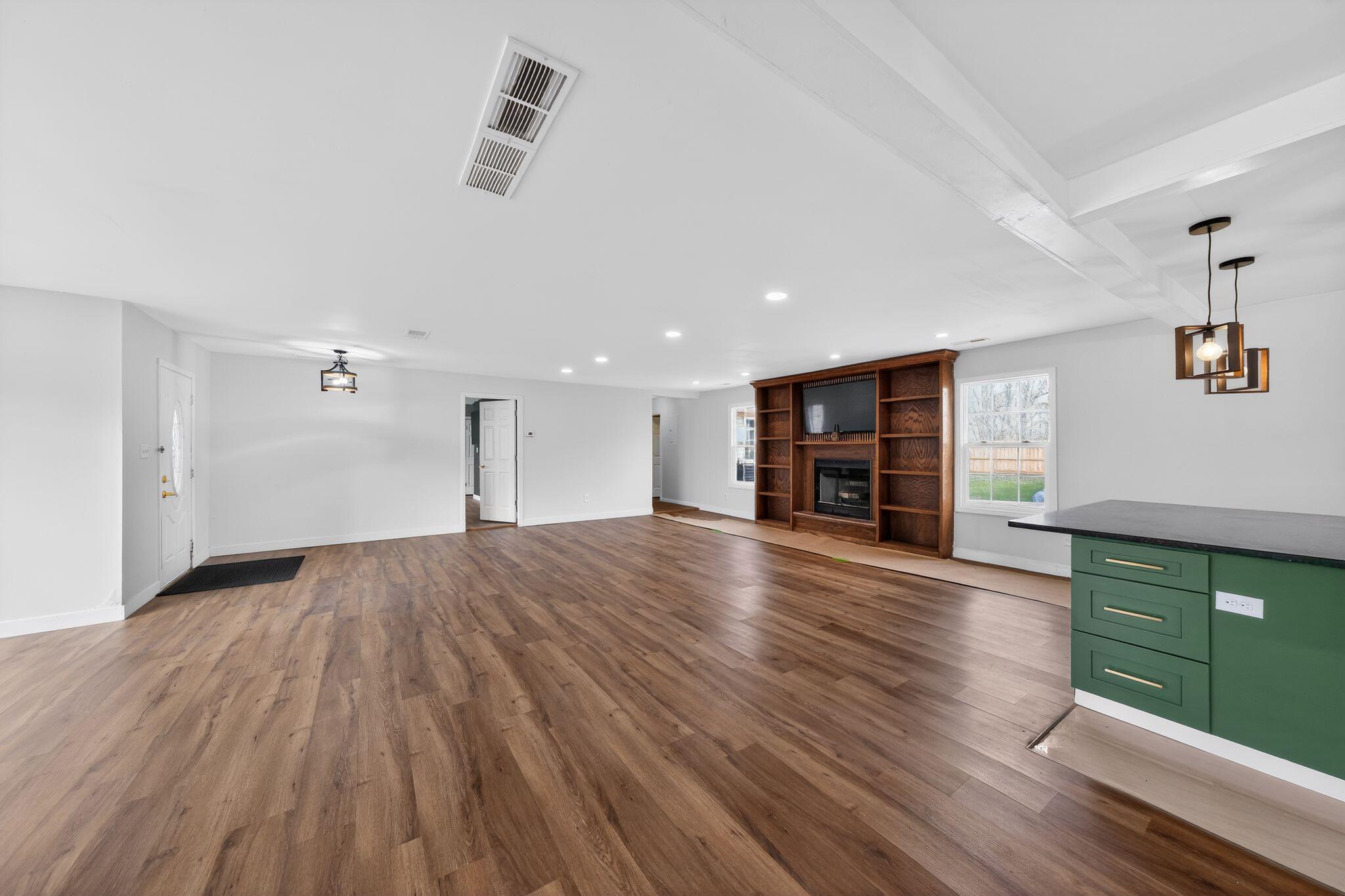 1908 Central Drive Gary, IN 46407 - Photo 4 of 29 wooden floor in an empty room with a window