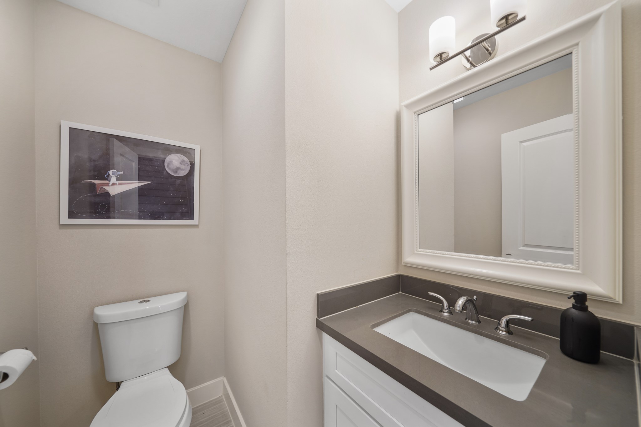 1824 Bonner Street Houston, TX 77007 - Photo 22 of 39 a bathroom with a granite countertop sink mirror and toilet