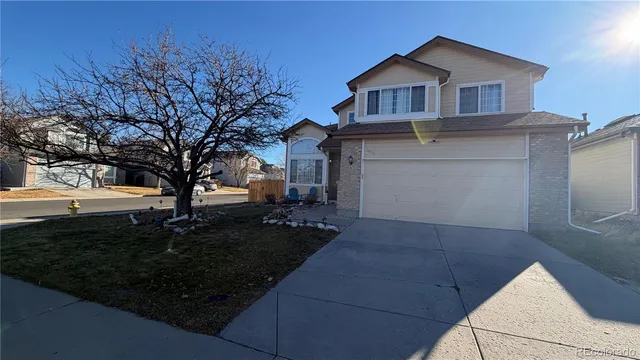 a view of house with outdoor space