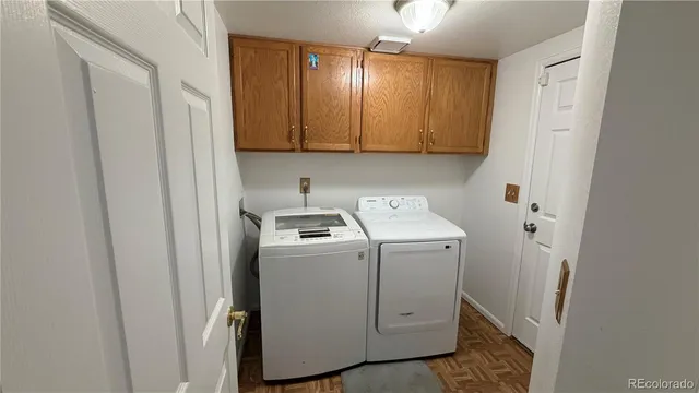 a view of utility room with washer and dryer