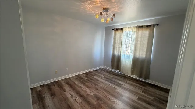 a view of a livingroom with a window