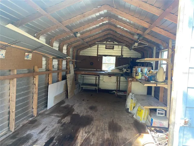 a view of a room with racks on the wall